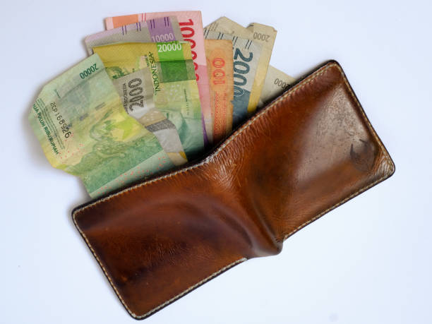 istock wallet with rupiah indonesian money on white background 1368237343