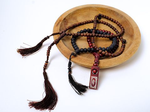 various kinds of handicrafts from wood. wooden bowl and beads wooden necklaces