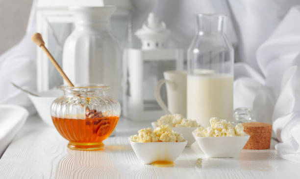 istock Fresh homemade cottage cheese with honey. 1368240977