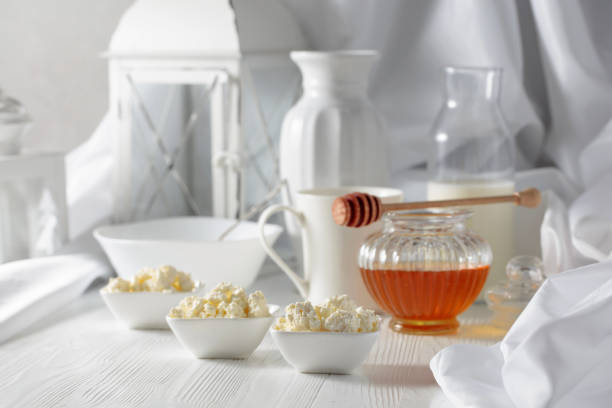 istock Fresh homemade cottage cheese with honey. 1368240980