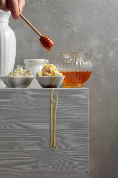istock Fresh cottage cheese or ricotta with honey. 1368240981