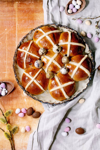istock Homemade Easter traditional hot cross buns on ceramic dish 1368242967