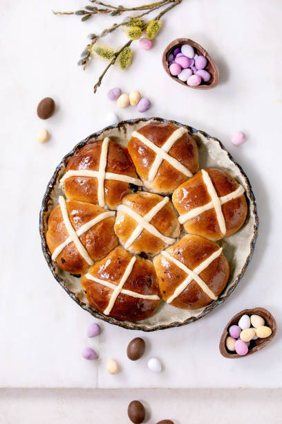 istock Homemade Easter traditional hot cross buns on ceramic dish 1368242968
