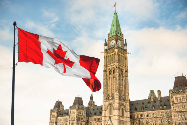 istock canada flag waving in ottawa 1368243011