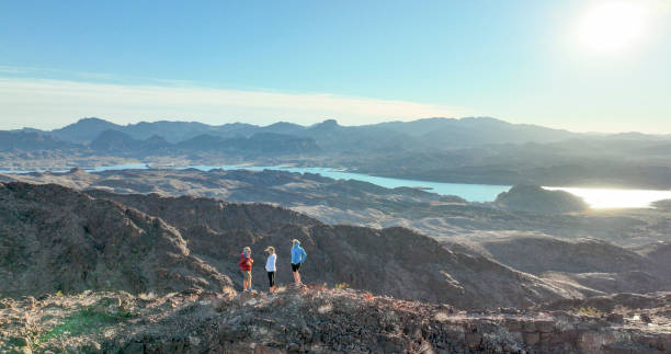 istock Aerial view, hikers follow route along desert ridge crest 1368243020