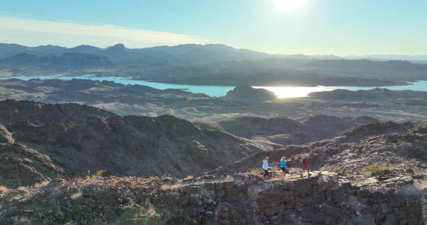 istock Aerial view, hikers follow route along desert ridge crest 1368243029