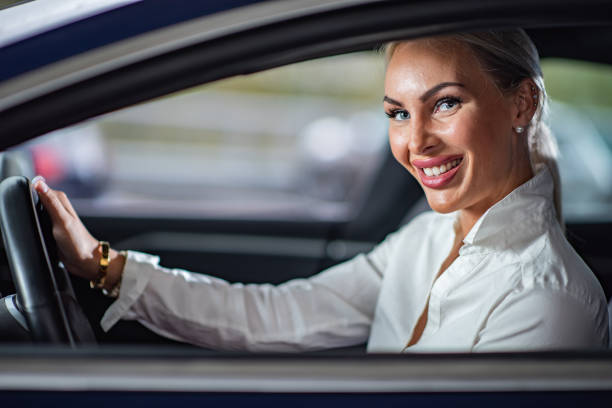 istock Businesswoman in car 1368244014