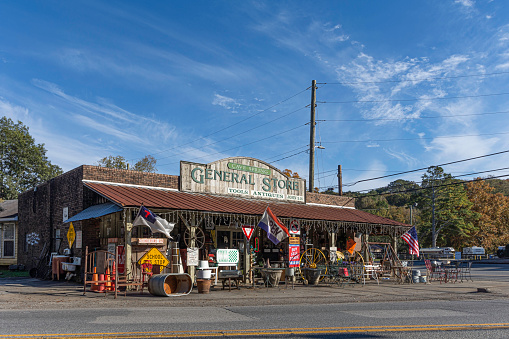 Cave Spring, Georgia, USA-Nov. 6, 2021: Old fashioned General Store with antiques in historic Cave Spring which boasts a large limestone spring and is on the historic Trail of Tears..