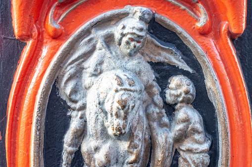 Erected in 1902, these figurines are carved into the street lampposts at various points in London. They celebrate St Martin as a Roman officer offering his coat to a beggar.