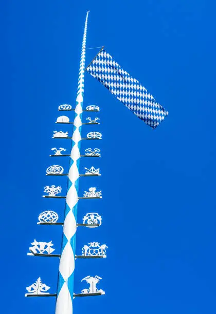 typical maypole in bavaria - germany