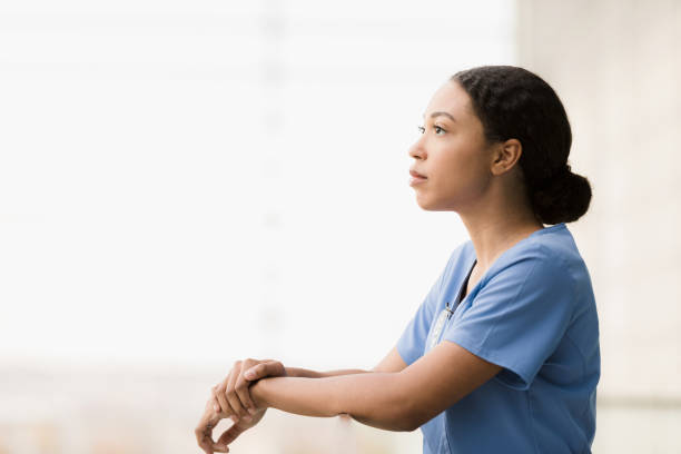 istock Female nursing student daydreams 1368253367