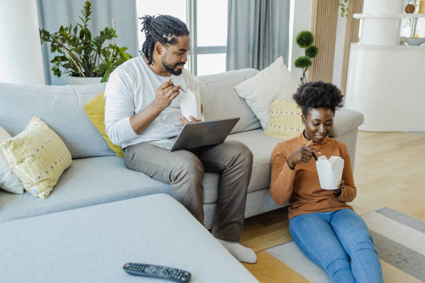 istock Lazy day at home and ordering food online 1368254365