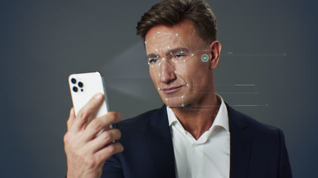 Face id Detection. Biometric Facial Recognition Security System 3d Scanning. Authentication of Businessman Using Smartphone with Modern Technology Person Identification. Cyber Protection Concept