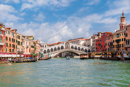 Venice, Italy - October 1, 2019: The famous Grand Canal and Rialto Bridge, right in the center of Venice