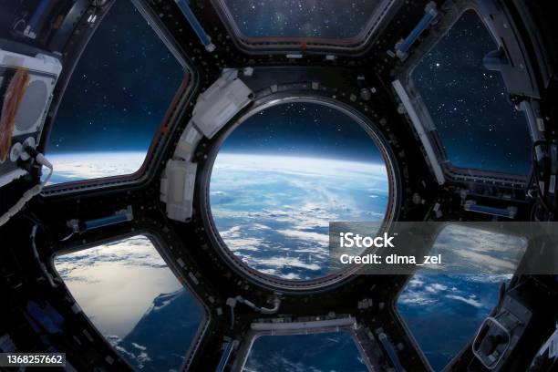 Cupola Porthole On Iss Orbital Station International Space Station Orbit And Deep Space With Stars View From Porthole Spaceship And Blue Planet People In Sapce Elements Of This Image Furnished By Nasa Stock Photo - Download Image Now