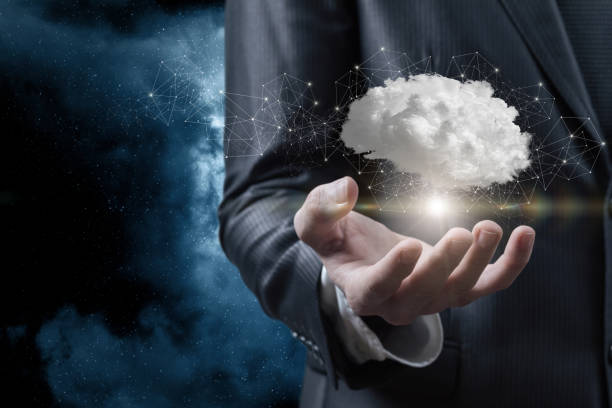 istock Businessman shows cloud in the form of a brain . 1368258010