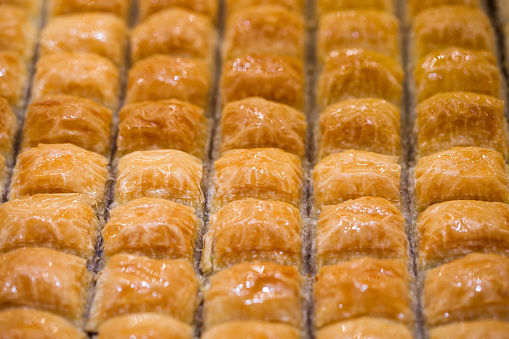 Baklava honey sweet, in pieces, selective focus.