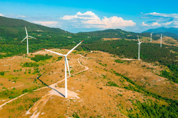 istock Wind driven generators produce alternative energy in summer 1368260339
