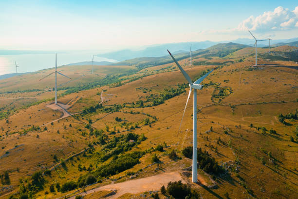 istock Wind generators produce renewable electric power in highland 1368260379