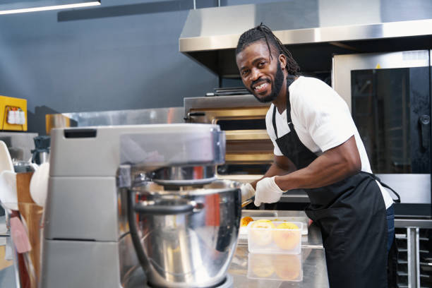 istock Professional american man working at the kitchen 1368263659