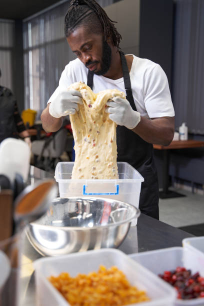 istock African man cooking dessert at the kitchen 1368263677