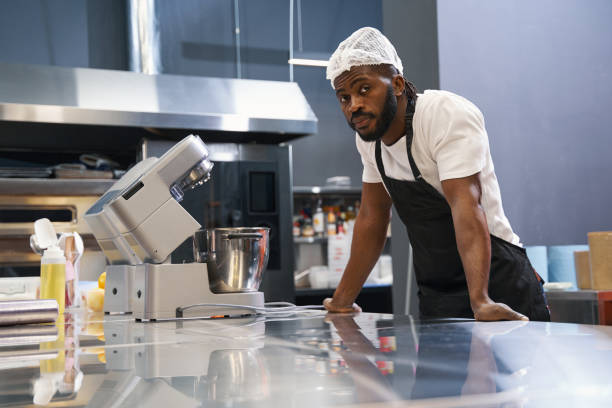 istock In the kitchen male resting after hard work 1368263697