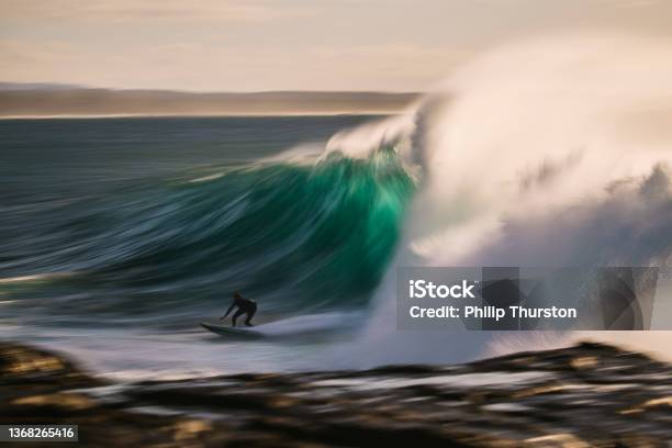Slow Shutter Of Surfer Riding Perfect Green Wave Stock Photo - Download Image Now - Surfing, Jade Green, Excitement