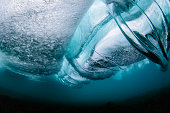 istock View from underneath a crashing ocean wave 1368265536