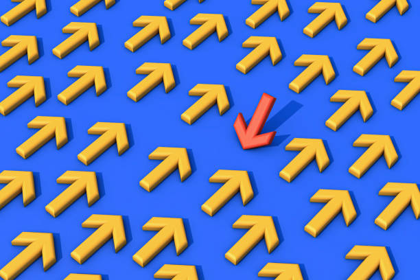 istock Red arrow sign changing direction from yellow arrow sign 1368267428