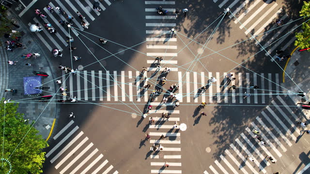 T/L Drone Point View of Pedestrian Crossing in Big City, Technology around Us