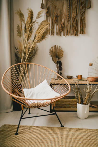 istock Interior in bohemian style with macrame hanging on the wall. 1368269970