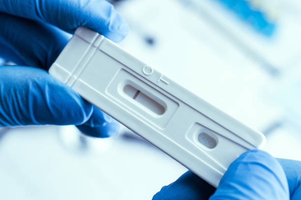 istock Antigen test antigen coronavirus kit. Laboratory hospital lab background. Doctor holding rapid covid medical test. Patient fast swab serology antibody specimen sample. 1368272938
