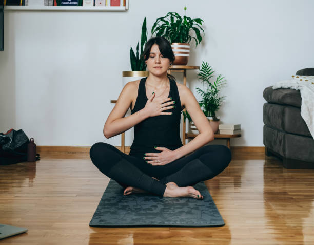 istock Woman Practicing Yoga in the Morning 1368273191