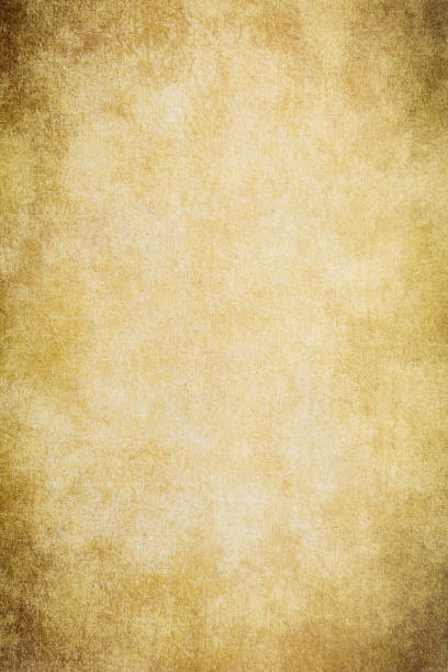 istock Vertical blank old paper with dark edges 1368275204
