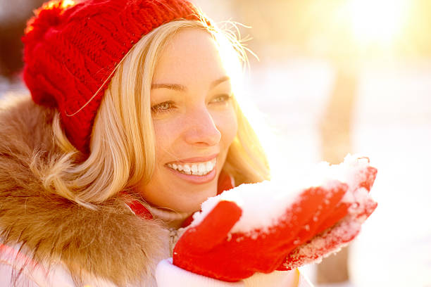 istock Girl with snow 136827525