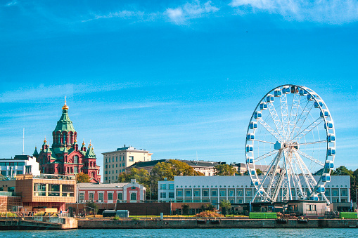 Waterfront of Helsinki, showing the ferris wheel and Uspensky Cathedral.