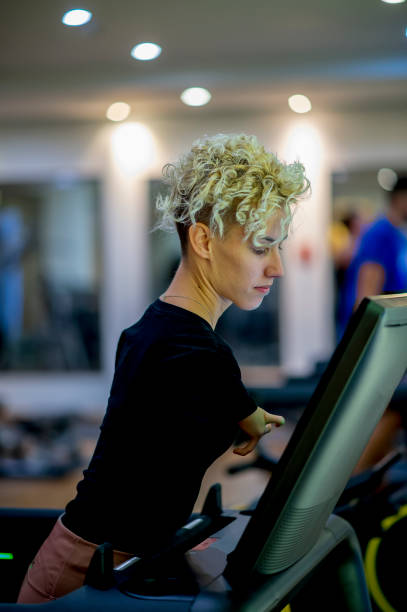 istock Disabled woman training in gym 1368277241
