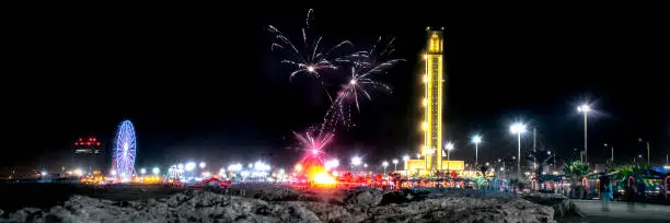 Photo of Fireworks at Sablettes promenade. Djamaa el Djazaïr the Great Mosque of Algiers.