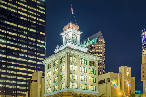 The Tampa City Hall historic building illuminated at night in downtown Tampa, Florida, USA.