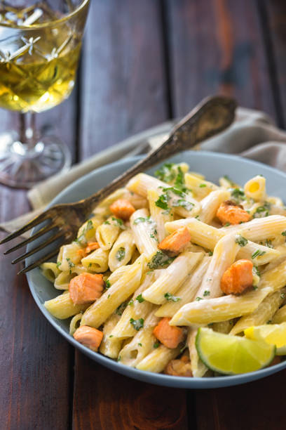 istock Penne with grilled salmon and herbs 1368280338