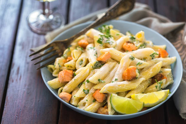 istock Penne with grilled salmon and herbs 1368280341