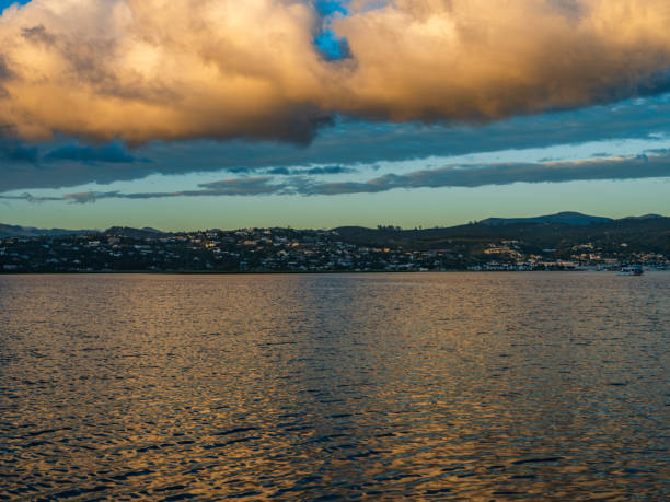 istock Dramatic sky clouds and reflection over Knysna lagoon in South Africa 1368281471