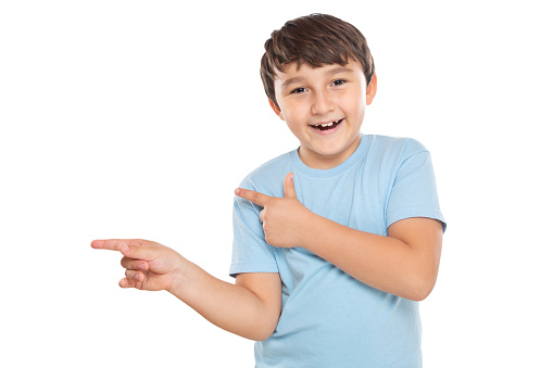 Child kid little boy showing with finger pointing on ad advertising isolated on a white background