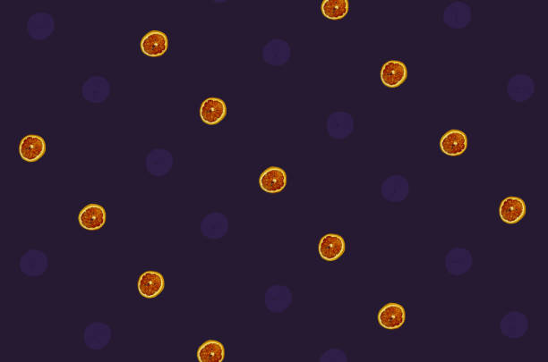 istock Colorful pattern of dried grapefruit slices on violet background. Dried grapefruit chips. Top view. Flat lay. Pop art 1368282925