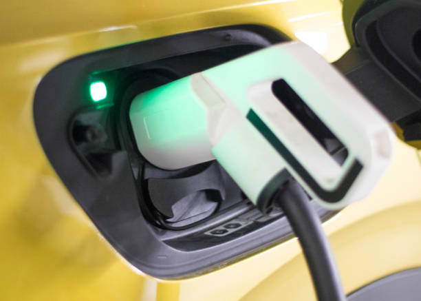 istock Yellow electric car charging 1368284958