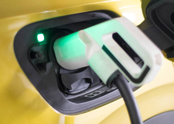 istock Yellow electric car charging 1368284968