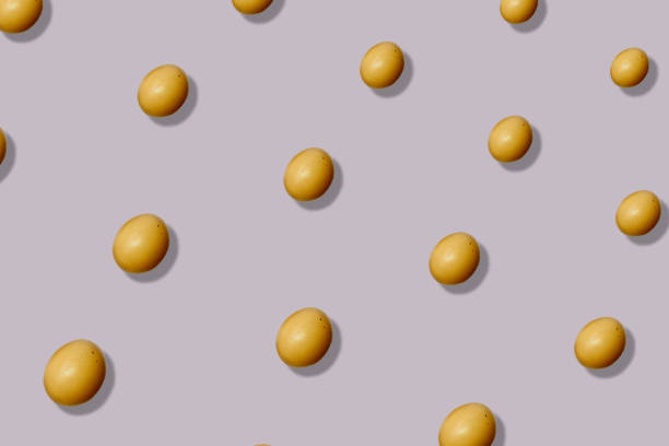 istock Colorful pattern of chicken eggs on pastel pink background. Top view. Flat lay. Pop art design 1368284974