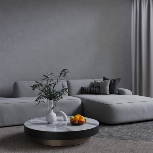 Minimalist gray interior with sofa and coffee table on the carpet. Big empty wall mock up. 3D render. stock photo