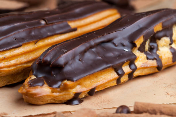 istock chocolate-covered custard eclair with creamy chocolate cream 1368291936