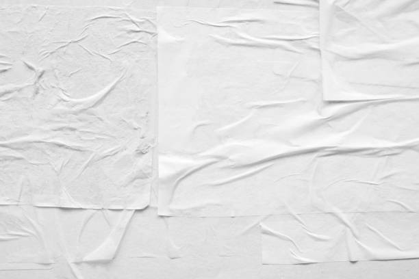 istock Blank white crumpled and creased paper poster texture 1368296437